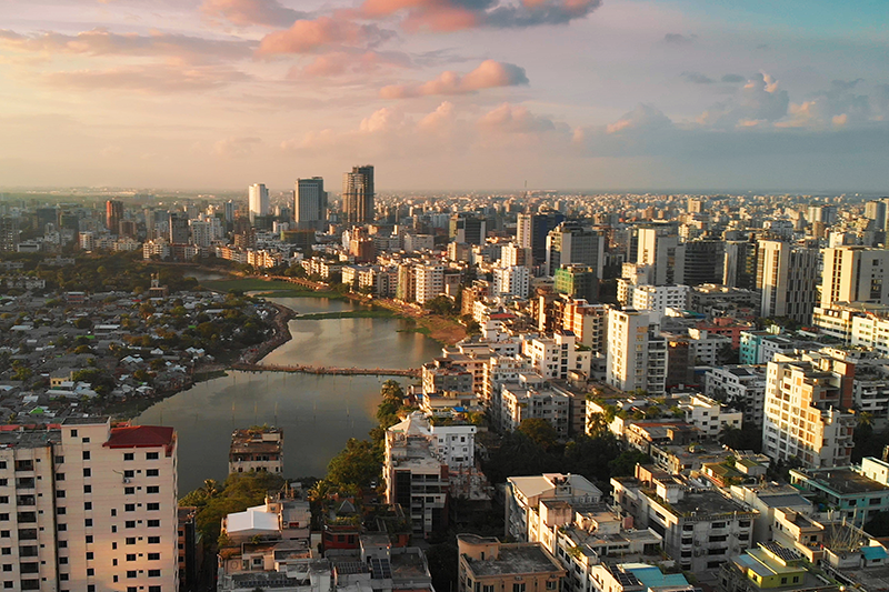 Aerial view of Dhaka skyline with densely packed buildings.