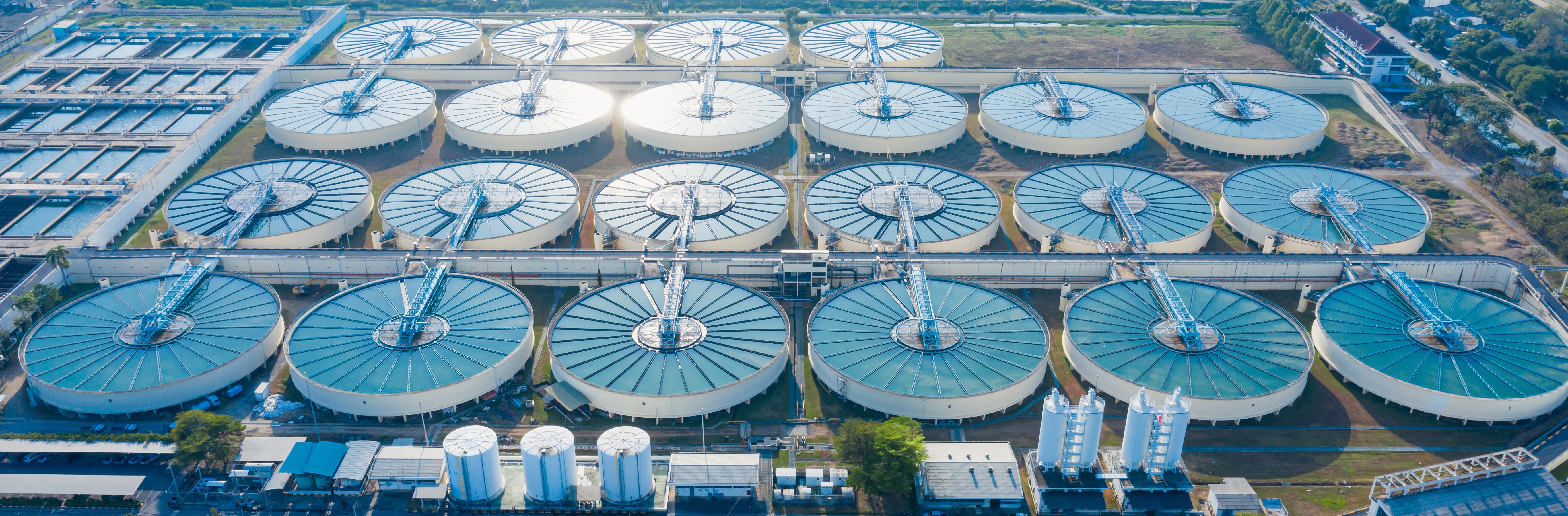 Aerial view of a drinking water treatment plant in an urban area.