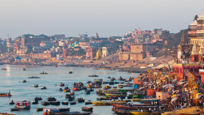 Early morning view of the Ganges River and Varanasi ghats during the Kumbh Mela festival.